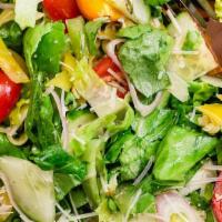 Mixed Green Salad · Tomatoes, cucumbers, and onions tossed and mixed greens. Dressing served on the side.