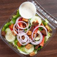 Fresh Garden Salad · Romaine and Iceberg lettuce, cucumbers, tomatoes, green peppers, onions, and croutons.