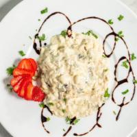 Portobello Mushroom · Grilled with melted Gorgonzola cheese and crab meat.