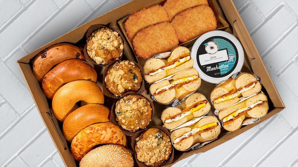 Brunch Box For Family · Manhattan Family Brunch Box.
Contains 6 bagels with a tub of cream cheese
4 Freshly baked Blueberry Muffins
4 Crispy Hashbrowns
3 Sandwiches cut in half.