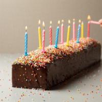 Birthday Cake · A classic birthday chocolate cake, coated with chocolate ganache and decorated with colorful...