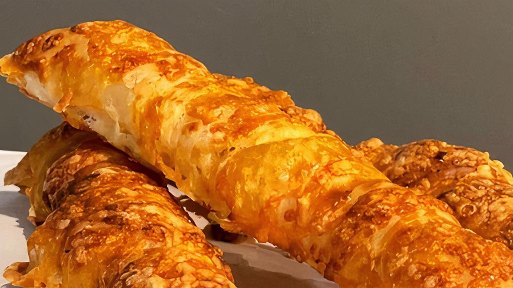 Cheese Stick · one of our famous items. Puff pastry dough covered with gouda cheese