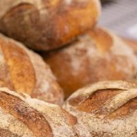Sourdough - Wild Loaf - Available Daily At 9Am · Sourdough wheat Bread.. We bake it daily to keep it fresh. It's available at 9 am daily
