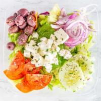 Greek Salad · Lettuce, tomatoes, cucumbers, olives, onions and feta cheese.