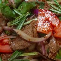 Beef Salad · Spicy. Marinated beef slices with veggies and spicy house salad dressing.
