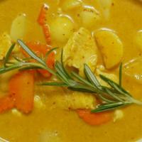 Yellow Curry · Spicy red curry made from dried red chili and spices, with sweet basil, bell pepper, green b...