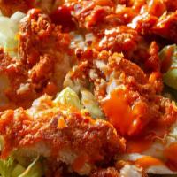 Buffalo Crispy Chicken Salad · With three cheeses over garden salad.