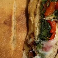 Chicken Cutlet Sandwich · Broccoli rabe, roasted peppers and provolone cheese.