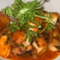 Braised Octopus, Gigante Beans, Olives, San Marzano Tomatoes · 