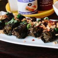 Beef Wrapped In Grape Leaves · served with house sauce