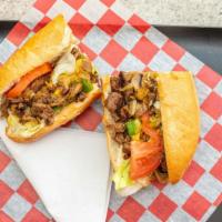 Philly Cheese Steak Sandwich · Ribeye steak, lettuce, tomato, mushrooms, grilled onions, green peppers, provolone cheese.