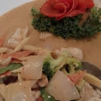 Muay Thai Chicken · Spicy level 3. Chicken and vegetables in peanut and red curry sauce.