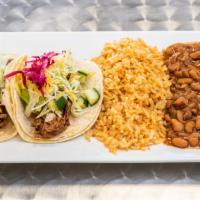 Taco Platter · Mexican Rice, charra beans two corn tortillas and the meat of your choice, served mexican st...