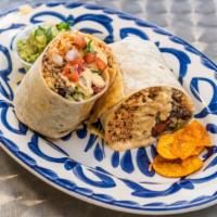 Burritos · A flour tortilla with the meat of your choice,rice, charro beans, lettuce, tomato, cheese, a...