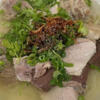 Beef Noodle Soup With Beef Meatball · All noodle soup is served with thinly sliced onion, scallion, cilantro, and with a side of b...