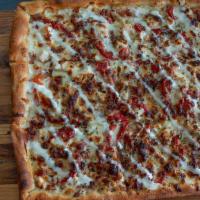 Chicken Ranch Pizza · White pizza with grilled chicken, roasted red pepper, bacon, ranch dressing, and mozzarella ...