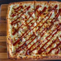 Bbq Chicken Pizza · White pizza with grilled chicken, BBQ sauce, and mozzarella cheese.