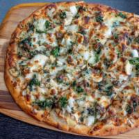 Veggie Flatbread · Mushrooms, onions, spinach and mozzarella cheese. Comes with a side of Santucci sauce.