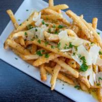 Garlic Parmesan Fries · Smothered in garlic butter and parmesan cheese.