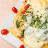 Chicken Florentine · Sautéed chicken, spinach, chopped tomatoes, white wine and topped  with mozzarella cheese.