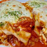 Meat Lasagna · Ground beef & Veal meat, ricotta, mozzarella, marinara.