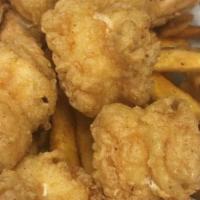 Fried Shrimp Basket (8) · Choice of potato fries, sweet potato fries, onion ring, or two corn. No substitution.
