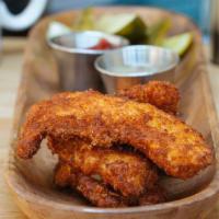 Panko-Crusted Chicken Strips · House-made panko-crusted chicken breast strips with honey mustard or BBQ sauce. Served with ...