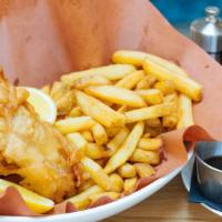 Fish & Chips · Beer-battered crispy cod served with tartar sauce, fries and a side of malt vinegar.