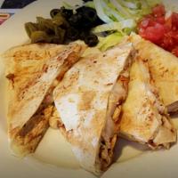 Chicken Quesadilla · Enjoy this grilled tortilla jam-packed with mozzarella and cheddar cheeses with grilled chic...