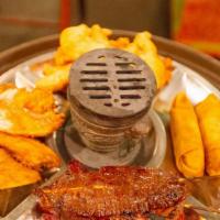 Pu Pu Platter ( For 2 ) · Spring roll, fried shrimp, beef teriyaki, chicken fingers, chicken wings and boneless spare ...