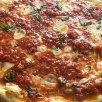 Margherita Pizza · Plum tomatoes, fresh mozzarella and basil.