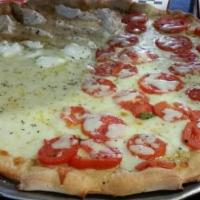 Fresca Pizza · Mozzarella cheese, tomato, garlic, fresh basil and ricotta cheese.
