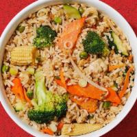 Fried Rice · Authentic fried rice cooked with egg, peas and carrots, green onions.