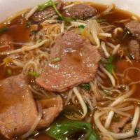 Rare Beef Pho / Pho Tai · Noodle soup with thin sliced, rare (cooked by boiling broth) top rounds.
