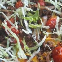 Out-N-In Pizza · FARM RAISED GROUND BEEF+TOMATOES+ AMERICAN CHEESE+GRILLED ONIONS+ SPECIAL SAUCE+FRESH LETTUCE