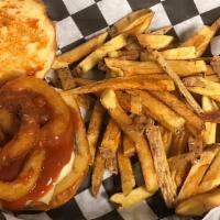 Rodeo Burger With Fries · topped with BBQ sauce and onion rings.