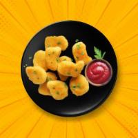 Breaded Corn Nuggets  · Deep fried, corn nuggets, until golden fried and crisp.