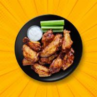 6 Traditional Wings · 6 classic bone in traditional wings served in a sauce of choice with a choice of 1 dipping s...