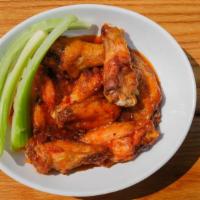 Bernie'S Wings · Choice of honey bbq, hot, mild, sweet & spicy garlic or insanity. Served with celery & blue ...