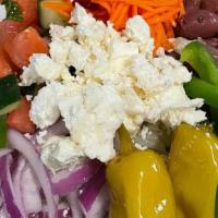Greek Salad · Iceberg lettuce, tomatoes, cucumbers, parsley, onions, green peppers, shredded carrots, pepp...