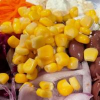 Mediterranean Salad · Iceberg lettuce, cucumbers, pickled red cabbage, shredded carrots, onions, sweet corn, feta ...