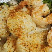 Broiled Combination · Flounder, 2 shrimps, 2 scallops. Served with rice and broccoli with garlic butter sauce and ...