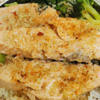 Broiled Salmons · Served with rice and broccoli with garlic butter sauce and old bay season.