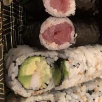 Maki Combo · California roll, tuna roll, and salmon roll. Served with soup and salad.