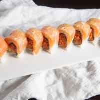 Yakuza Roll (8) · Eight pieces. Spicy tuna, avocado, salmon, and lemon with a side ponzu sauce.
