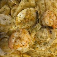 Seafood Pasta (Noodles) · Shrimp, black mussels, clams and crawfish in garlic butter sauce.