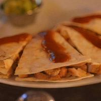 Chicken Quesadilla · Adobo seasoned roasted chicken with cheddar and jack cheeses, pico de gallo and caramelized ...