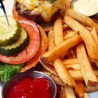Turkey Burger · Jalapeño and cumin scented turkey burger, melted cheddar and jack cheeses, guacamole, lettuc...