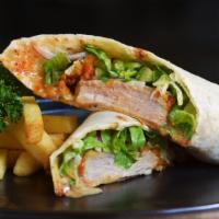 Chicken Caesar Wrap · Grilled chicken, romaine lettuce, parmesan cheese, and caesar dressing folded into a wrap.