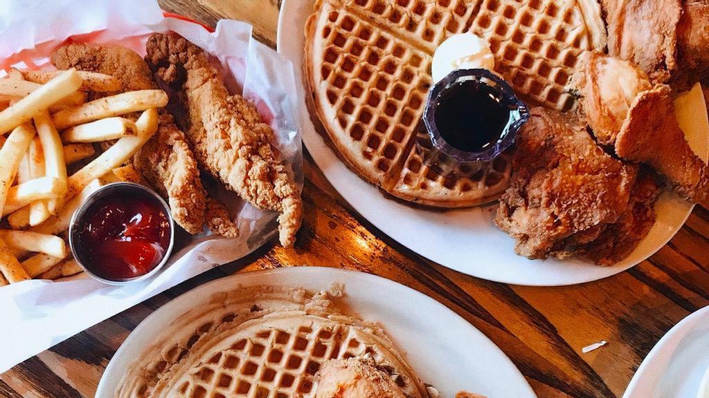 Waffle Combo Plates  One · 2 PC  chicken  2 waffles  2 fruit Cups 2 butter  2 Syrup 1 (side of waffle Fries). 2 soda

1-2 POEPLE  or shared plate